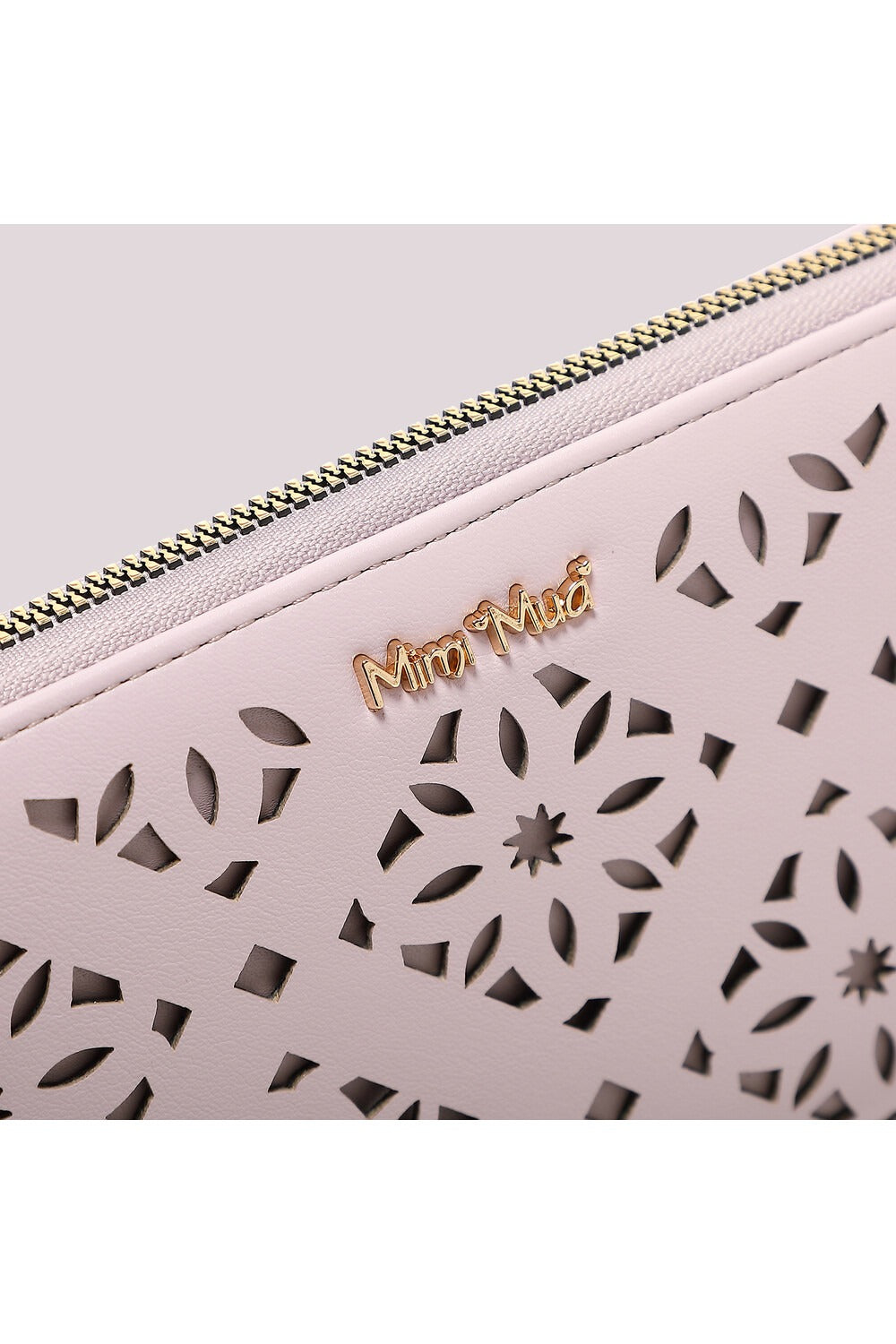 PORTAFOGLIO GRANDE CON MOTIVO TRAFORATO Mimi-Mua