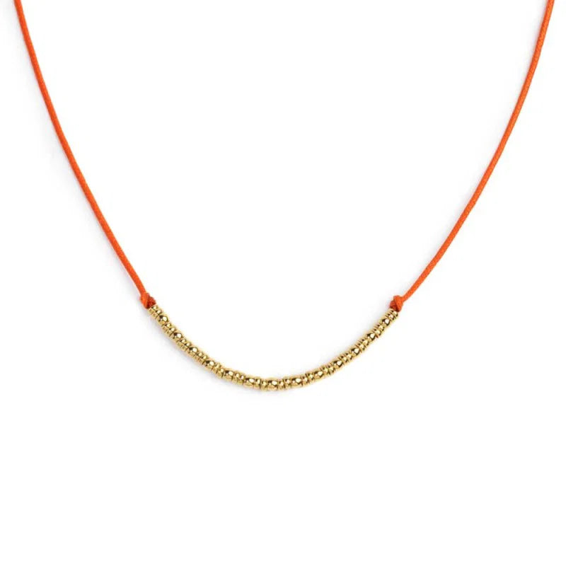 Collana cordino con sfere e rondelle al centro Marlù