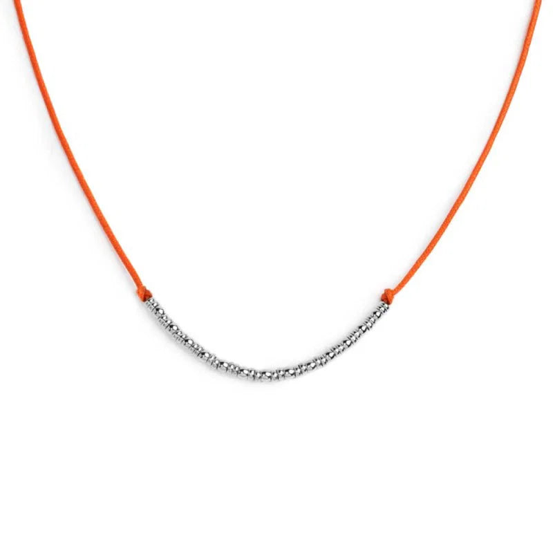Collana cordino con sfere e rondelle al centro Marlù