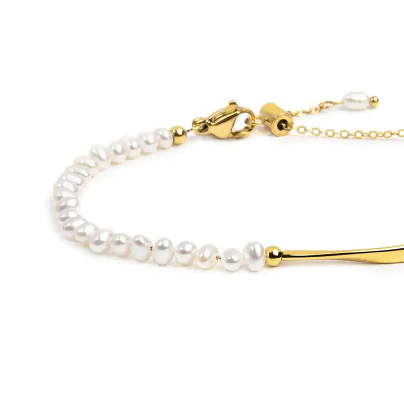 Bracciale semi rigido con tubolare twisted e catena con perle Marlù