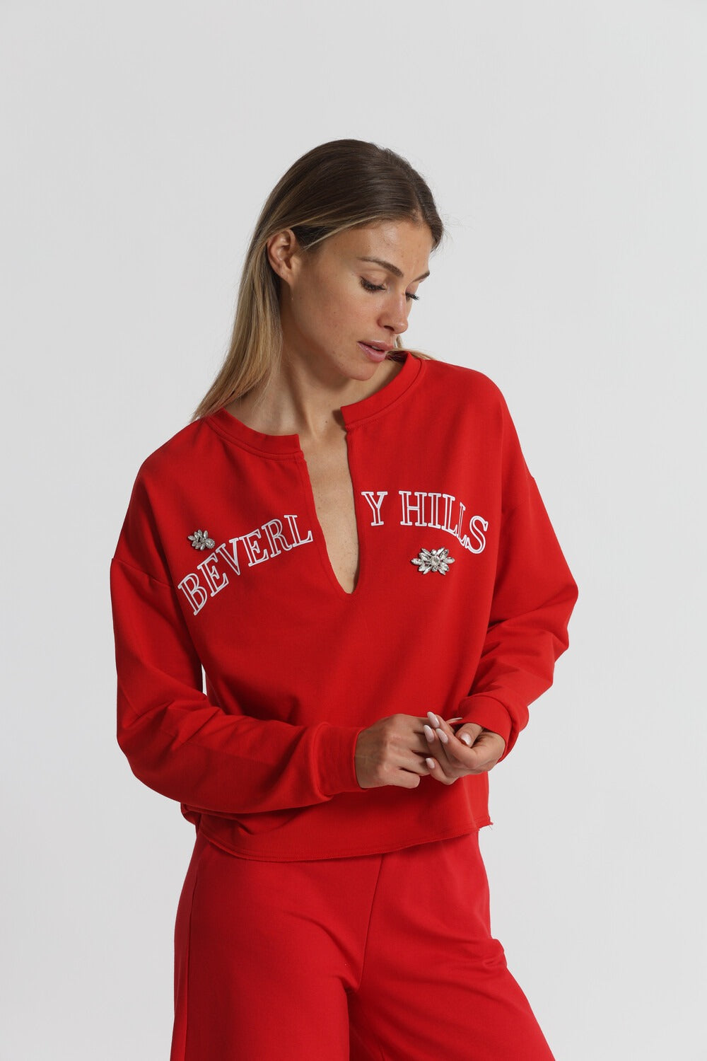 FELPA "BEVERLY HILLS" CON SCOLLO A V E DETTAGLI IN STRASS MIMI-MUA