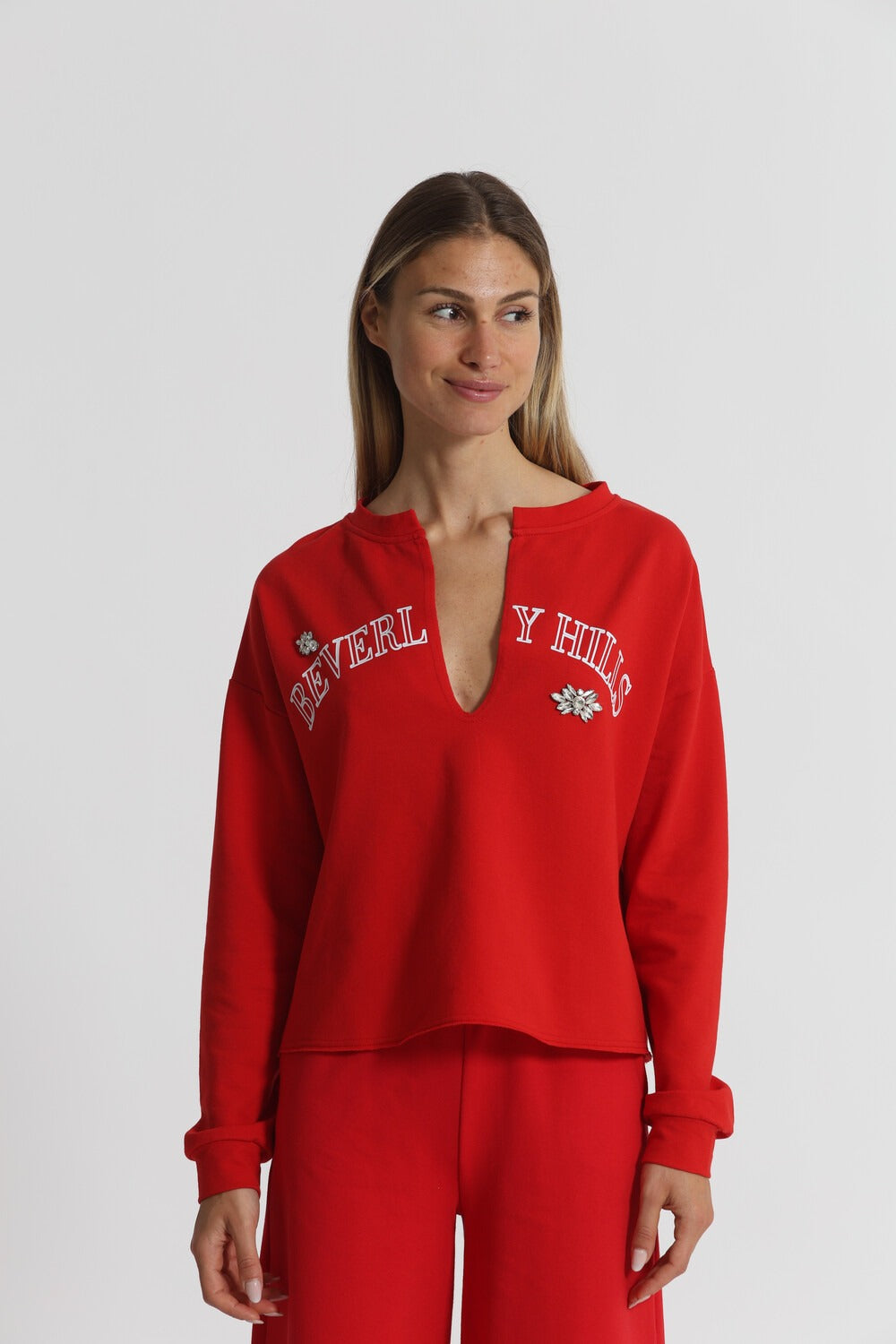 FELPA "BEVERLY HILLS" CON SCOLLO A V E DETTAGLI IN STRASS MIMI-MUA