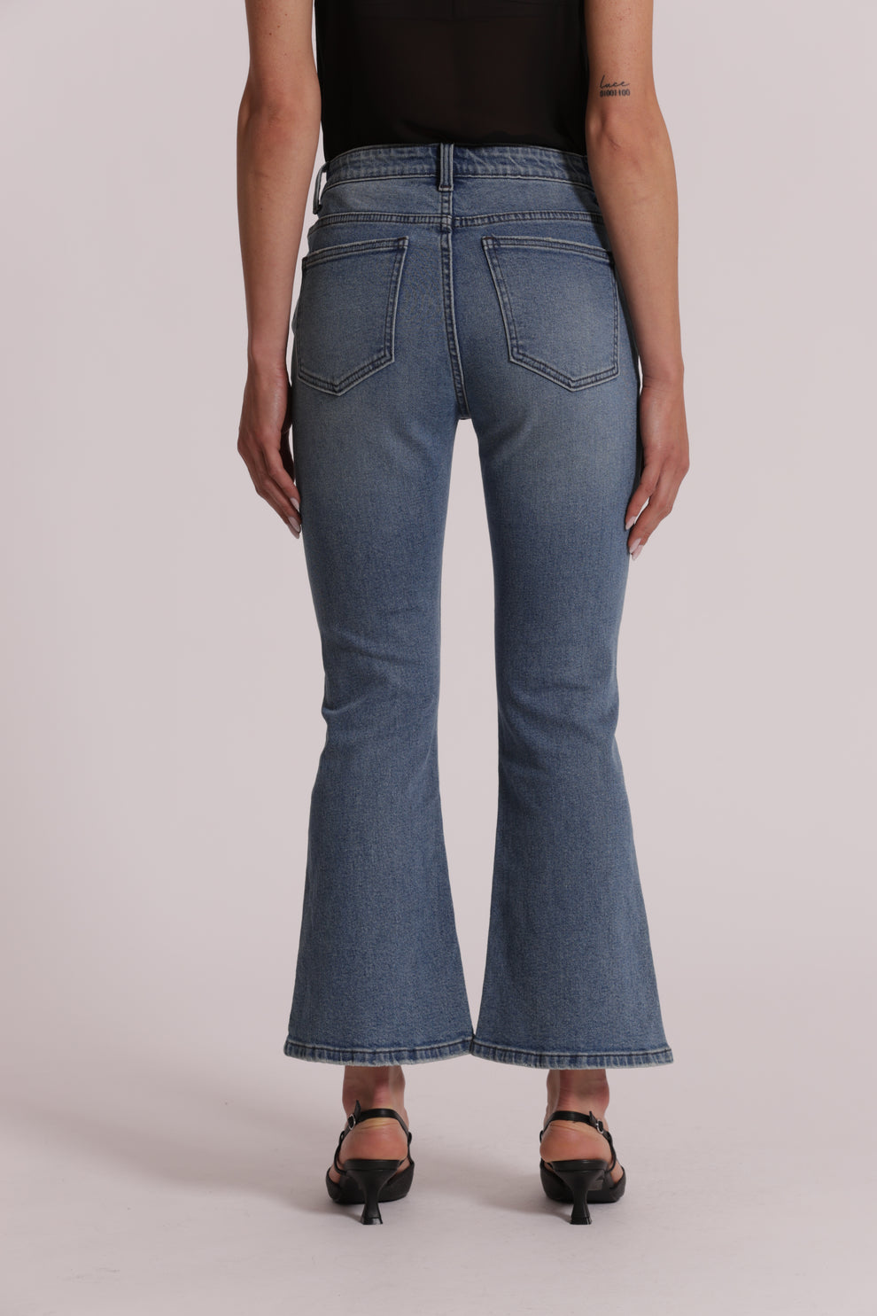 JEANS FLARE CON APPLICAZIONI FLOREALI MIMI-MUA