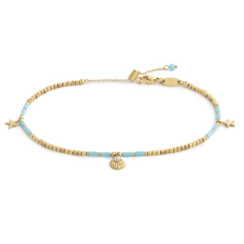 Cavigliera con ematite cubica alternata a perline conchiglia e stelle marine pendenti Marlú