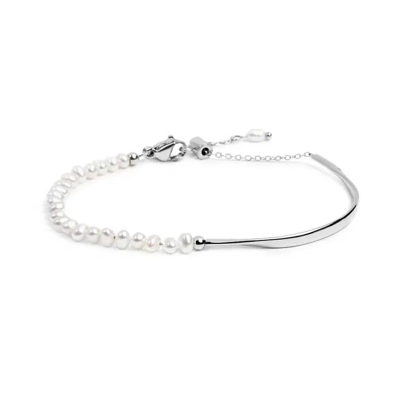 Bracciale semi rigido con tubolare twisted e catena con perle Marlù