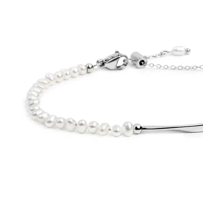 Bracciale semi rigido con tubolare twisted e catena con perle Marlù